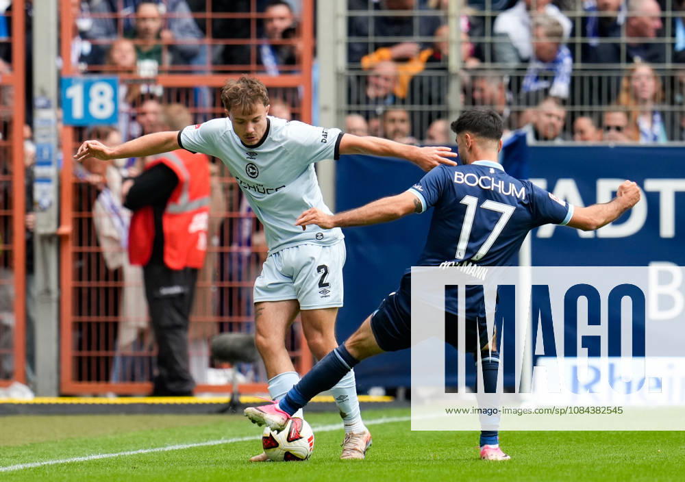 Felix Hagmann of DSC Arminia Bielefeld (No. 2) in a tackle with Gerrit Holtmann of VfL Bochum 1848 (No. 17), GER, VfL Bochum 1848 vs. DSC Arminia Bielefeld, 2. Bundesliga, Matchday 7, 2026–27 season, Vonovia Ruhrstadion, Bochum, October 11, 2026 DFL REGULATIONS PROHIBIT ANY USE OF PHOTOGRAPHS AS IMAGE SEQUENCES AND OR QUASI-VIDEO VfL Bochum 1848 vs. DSC Arminia Bielefeld, 2. Bundesliga, Matchday 7, 2026–27 Season, October 11, 2026, Bochum