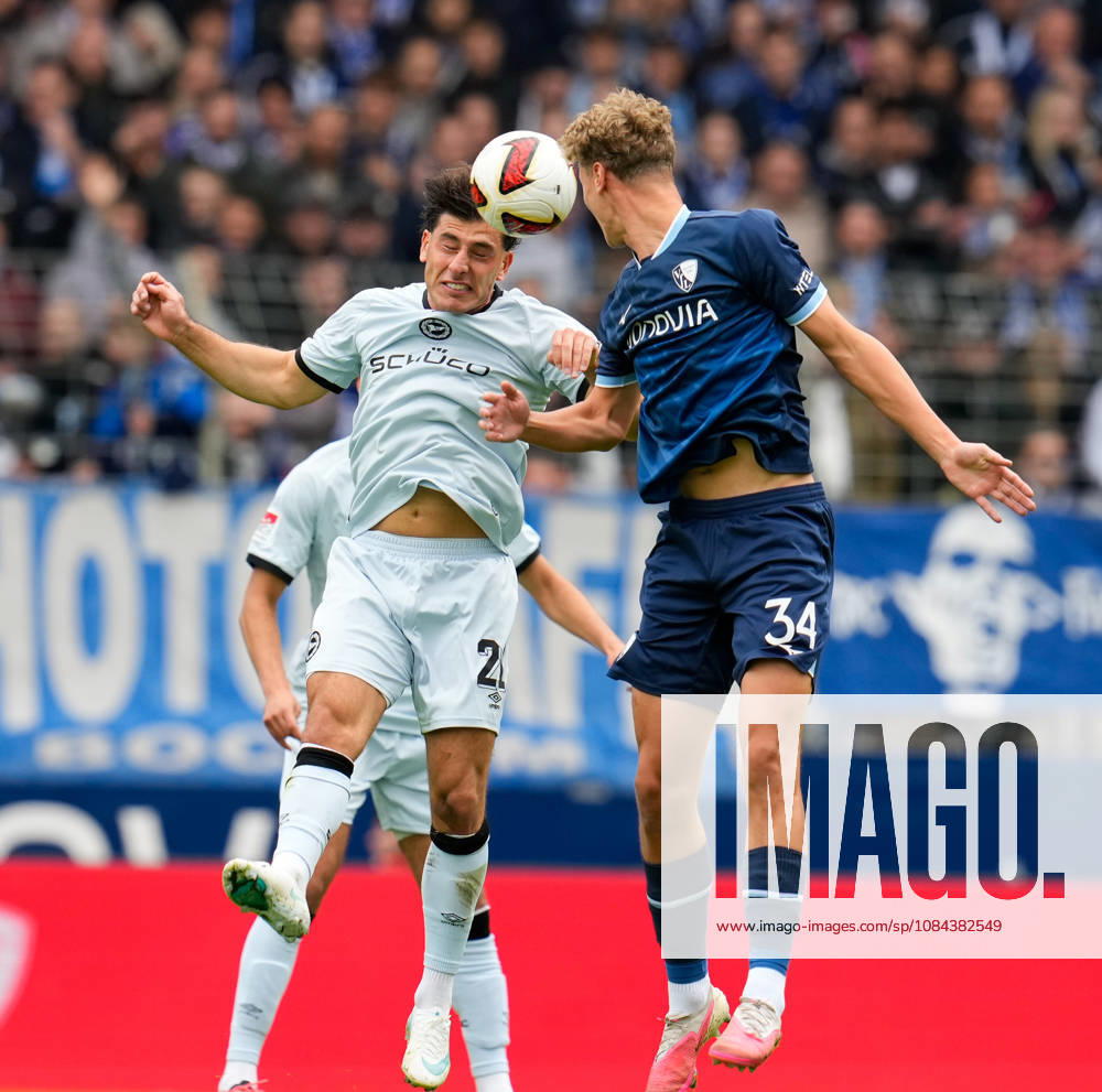 Stefano Russo (DSC Arminia Bielefeld, 21) jumps for a header in a duel against Tom Meyer (VfL Bochum 1848, 34, GER), VfL Bochum 1848 vs. DSC Arminia Bielefeld, 2. Bundesliga, Matchday 7, 2026–27 season, Vonovia Ruhrstadion, Bochum, October 11, 2026 DFL REGULATIONS PROHIBIT ANY USE OF PHOTOGRAPHS AS IMAGE SEQUENCES AND OR QUASI-VIDEO VfL Bochum 1848 vs. DSC Arminia Bielefeld, 2. Bundesliga, Matchday 7, 2026–27 Season, October 11, 2026, Bochum