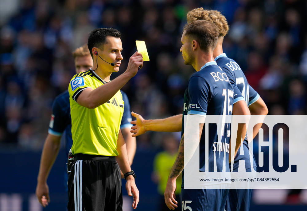 Referee Konrad Oldhafer shows Michael Steinwender of VfL Bochum 1848, No. 15, a yellow card (GER), VfL Bochum 1848 vs. DSC Arminia Bielefeld, 2. Bundesliga, Matchday 7, 2026–27 season, Vonovia Ruhrstadion, Bochum, October 11, 2026. DFL regulations prohibit any use of photographs as image sequences and or quasi-video. VfL Bochum 1848 vs. DSC Arminia Bielefeld, 2. Bundesliga, Matchday 7, 2026–27 Season, October 11, 2026, Bochum