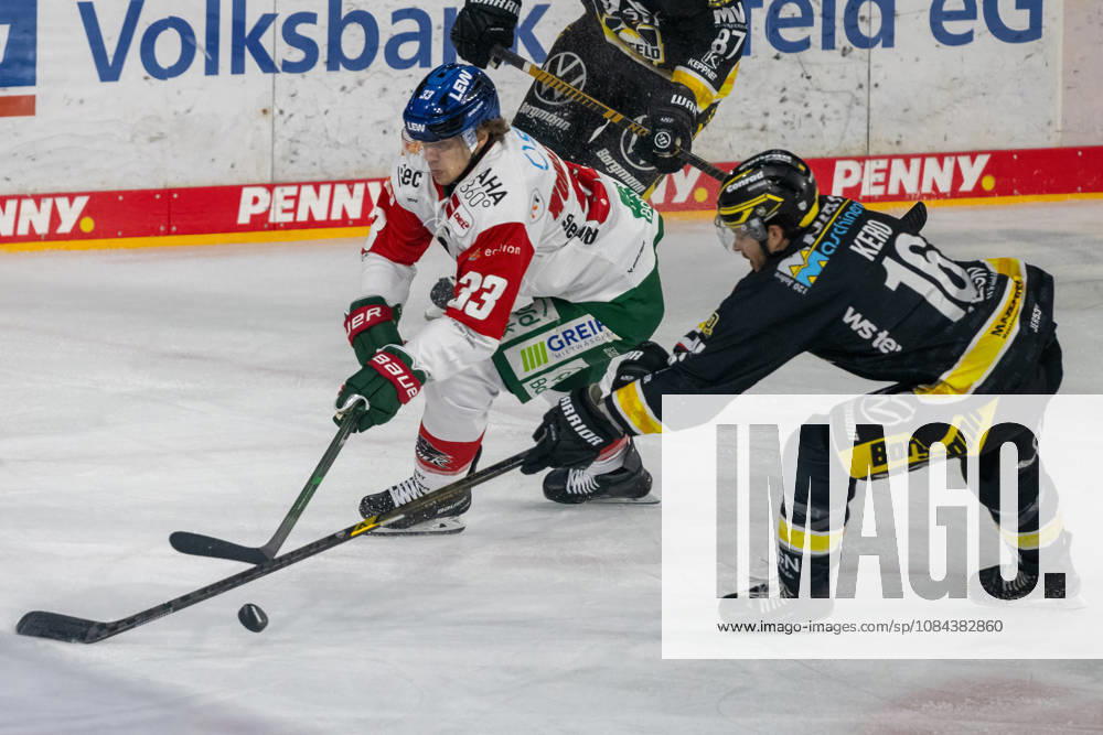 Face-off between Tim Wolgemuth of the Augsburger Panther, 33, and Tanner Kero of the Krefeld Pinguine, 16; Krefeld Pinguine vs. Augsburger Panther, ice hockey, Penny DEL, Matchday 8, 2026–2027 season, October 11, 2026, Krefeld Pinguine vs. Augsburger Panther, ice hockey, Penny DEL, Matchday 8, 2026–2027 season, October 11, 2026, Krefeld