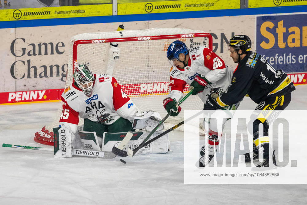 A battle between Fabrizio Pilu of the Augsburger Panther (No. 68) and Tanner Kero of the Krefeld Pinguine (No. 16) in front of the net of Tobias Ancicka of the Augsburger Panther (No. 45). Krefeld Pinguine vs. Augsburger Panther, ice hockey, Penny DEL, Matchday 8, 2026–2027 season, October 11, 2026 Krefeld Pinguine vs. Augsburger Panther, ice hockey, Penny DEL, Matchday 8, 2026–2027 season, October 11, 2026, Krefeld