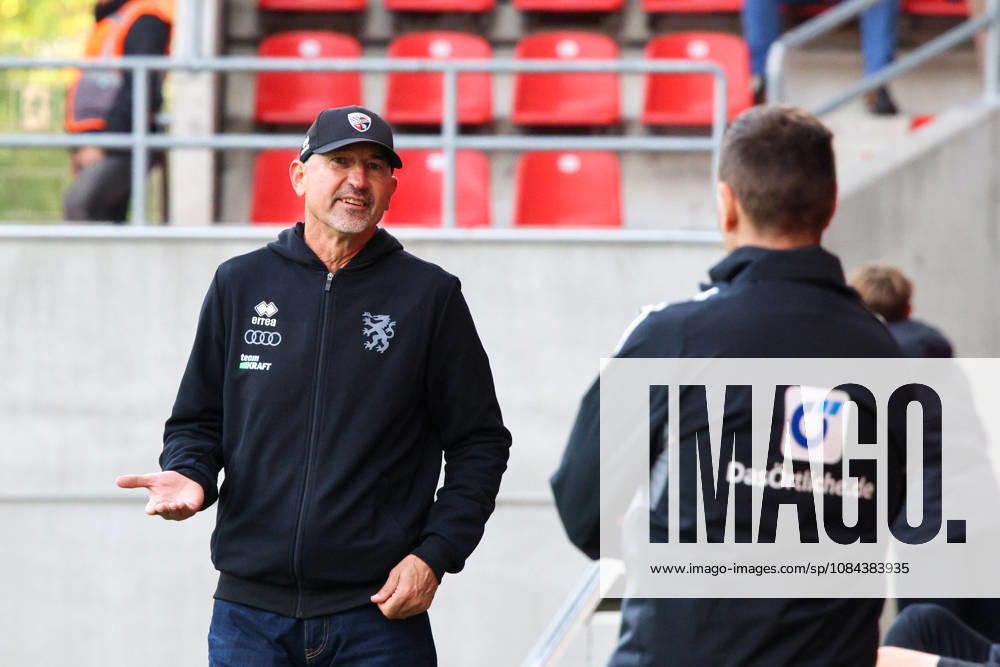 Coach Achim Beierlorzer, head coach of FC Ingolstadt 04, is seen discussing with the fourth official during the match between FC Ingolstadt 04 and SV Wehen Wiesbaden on October 11, 2026, DFB regulations prohibit any use of photographs as image sequences and or quasi-video. GER, Soccer, 3. Liga, Matchday 8, FC Ingolstadt 04 vs. SV Wehen Wiesbaden, October 11, 2026, Audi Sportpark Ingolstadt