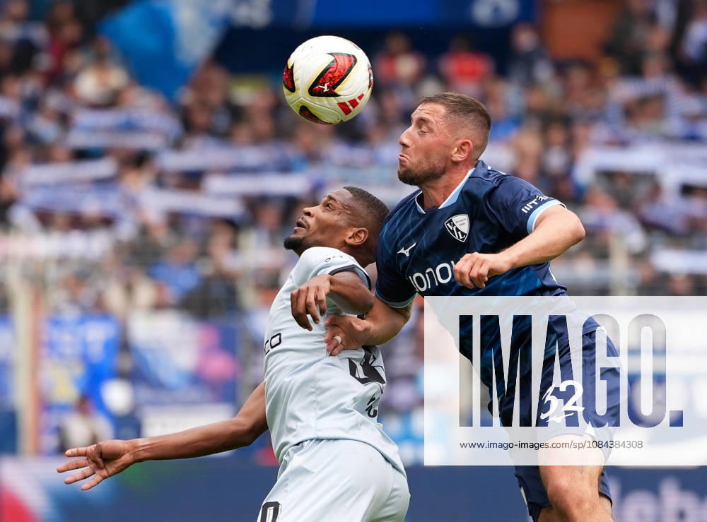 Isaiah Young of DSC Arminia Bielefeld, 30, in a tackle with Maximilian Wittek of VfL Bochum 1848, 32, GER, VfL Bochum 1848 vs. DSC Arminia Bielefeld, 2. Bundesliga, Matchday 7, 2026–27 season, Vonovia Ruhrstadion, Bochum, October 11, 2026 DFL REGULATIONS PROHIBIT ANY USE OF PHOTOGRAPHS AS IMAGE SEQUENCES AND OR QUASI-VIDEO VfL Bochum 1848 vs. DSC Arminia Bielefeld, 2. Bundesliga, Matchday 7, 2026–27 Season, October 11, 2026, Bochum