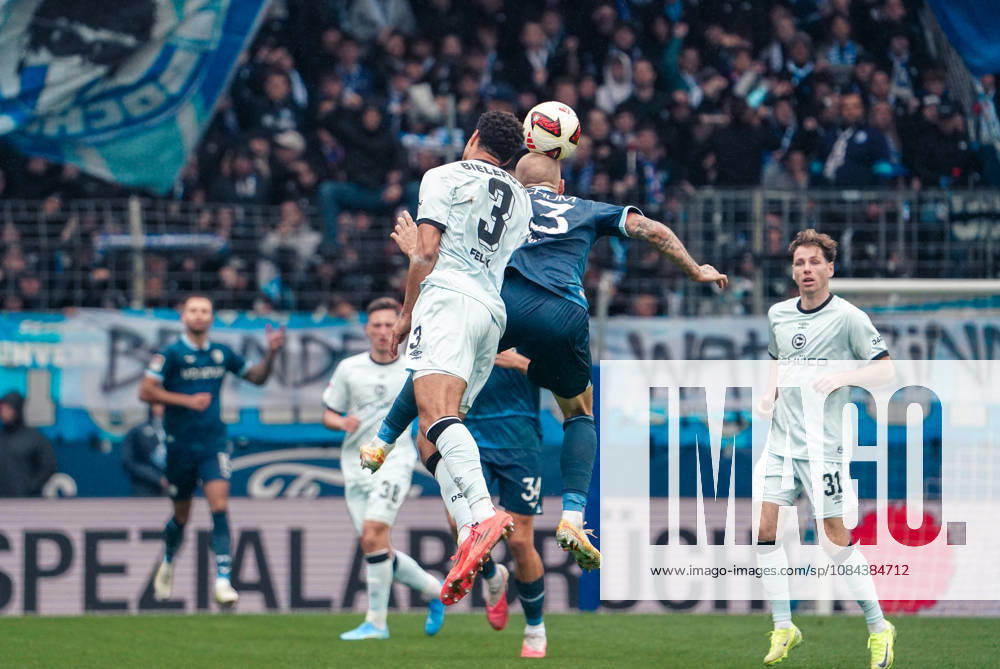 Germany Soccer 2. Bundesliga 2026–2027, Matchday 7: VfL Bochum vs. Arminia Bielefeld at Vonovia Ruhrstadion in Bochum; aerial duel between Philipp Hofmann (VfL Bochum, 33) and Joel Felix (Arminia Bielefeld, 3)