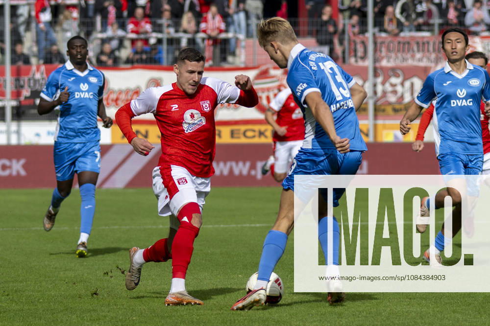 Regionalliga Northeast, Season 26-27: Hallescher FC vs. RSV Eintracht 1949 e.V., Halle, Germany, October 11, 2026. Pictured, from left: Marius Hauptmann (Halle) and Jules Hasenberg (RSV Halle), Saale-Leuna Chemie Stadium, Saxony-Anhalt, Germany