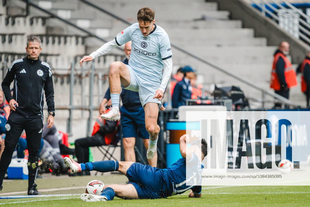 Bochum, Germany October 11, 2026 2. Bundesliga 2026–2027 Matchday 7 VfL Bochum 1848 vs. DSC Arminia Bielefeld Pictured from left in a tackle: Joel Grodowski (DSC) and Gerrit Holtmann (BOC). DFL and DFB regulations prohibit any use of photographs as image sequences and or quasi-video. Vonovia Ruhrstadion, North Rhine-Westphalia