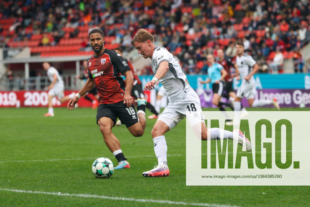 Ingolstadt, Germany October 11, 2026 3rd League 2026–2027 Matchday 8 FC Ingolstadt 04 vs. SV Wehen Wiesbaden Pictured from left: Keanan Bennetts (FCI) and Fabian Greilinger (SVWW) in a tackle. DFB and DFL regulations prohibit any use of photographs as image sequences and or quasi-video