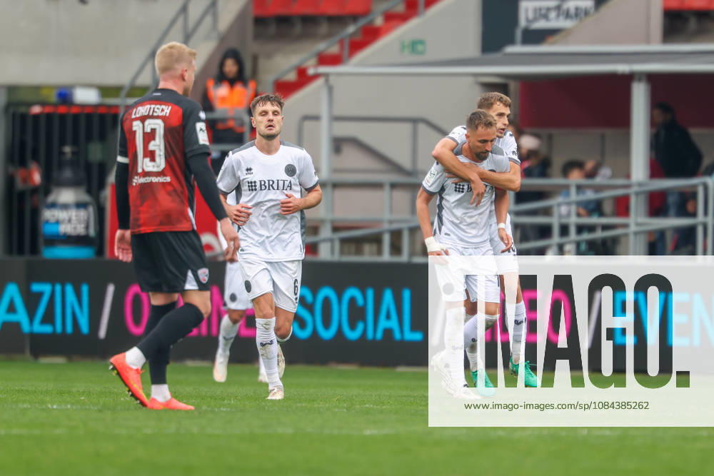 Ingolstadt, Germany October 11, 2026 3rd Division 2026–2027 Matchday 8 FC Ingolstadt 04 vs. SV Wehen Wiesbaden Pictured in the crowd: goal scorer Florian Hübner (Huebner) of SVWW celebrates his 0–1 goal with his teammates, DFB and DFL regulations prohibit any use of photographs as image sequences and or quasi-video