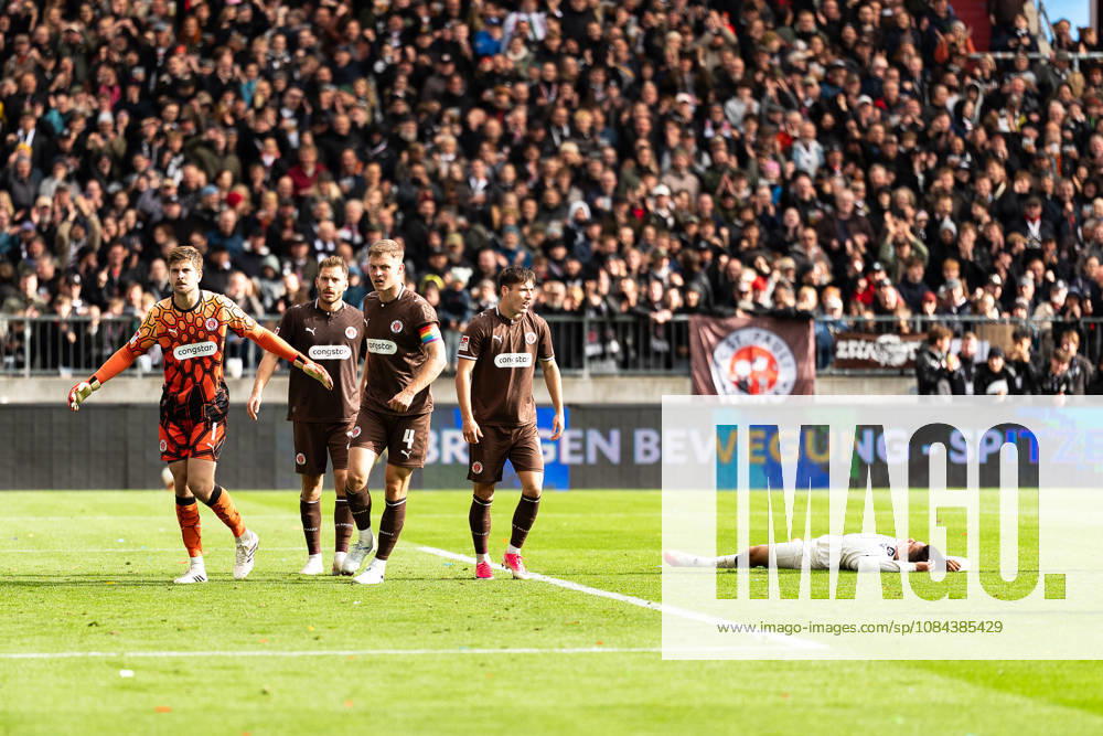 Shio Fukuda, Karlsruher SC, 13 (on the ground); goalkeeper Ben Voll, FC St. Pauli, 01; Lars Ritzka, FC St. Pauli, 21; David Nemeth, FC St. Pauli, 04, Arkadiusz Pyrka, FC St. Pauli, 11, GER, FC St. Pauli vs. Karlsruher SC, soccer, 2. Bundesliga, Matchday 7, 2026–2027 season, October 11, 2026 DFL regulations prohibit any use of photographs as image sequences and or quasi-video GER, FC St. Pauli vs. Karlsruher SC, soccer, 2. Bundesliga, Matchday 7, 2026–2027 season, October 11, 2026, Hamburg