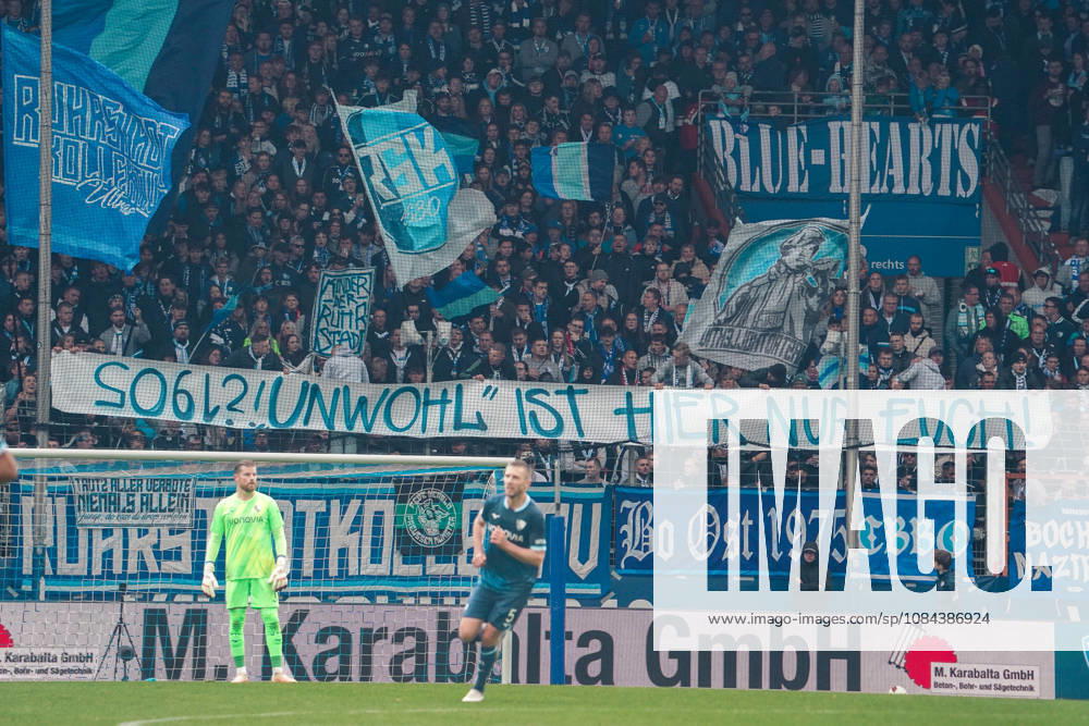 German Soccer 2. Bundesliga 2026–2027, Matchday 7: VfL Bochum vs. Arminia Bielefeld, Vonovia Ruhrstadion, Bochum. VfL Bochum fans unfurl a banner in the East Stand reading Only you feel out of place here and wave blue-and-white flags. Bochum, Vonovia Ruhrstadion, Germany