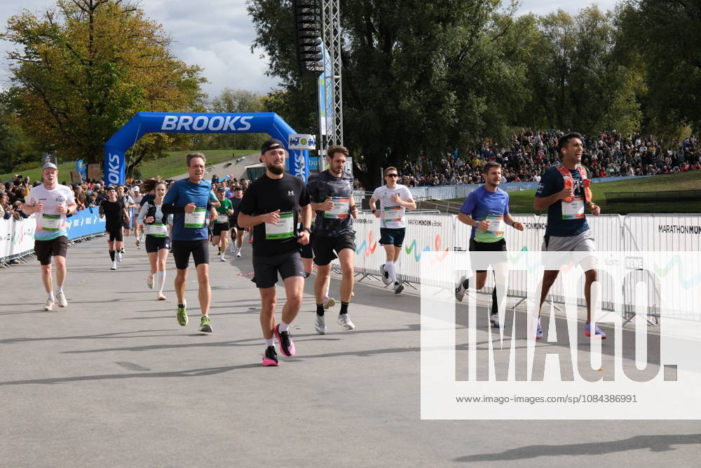 Munich Marathon 2026 MUNICH, GERMANY - OCTOBER 11: Runners pass under the Brooks finish arch at the Olympic Park during the 2026 Munich Marathon in Munich, Germany on October 11, 2026. The annual 42.195-kilometer race draws thousands of participants from Germany and abroad. Merve Goettl Anadolu Munih Germany. Editorial use only. Please get in touch for any other usage.