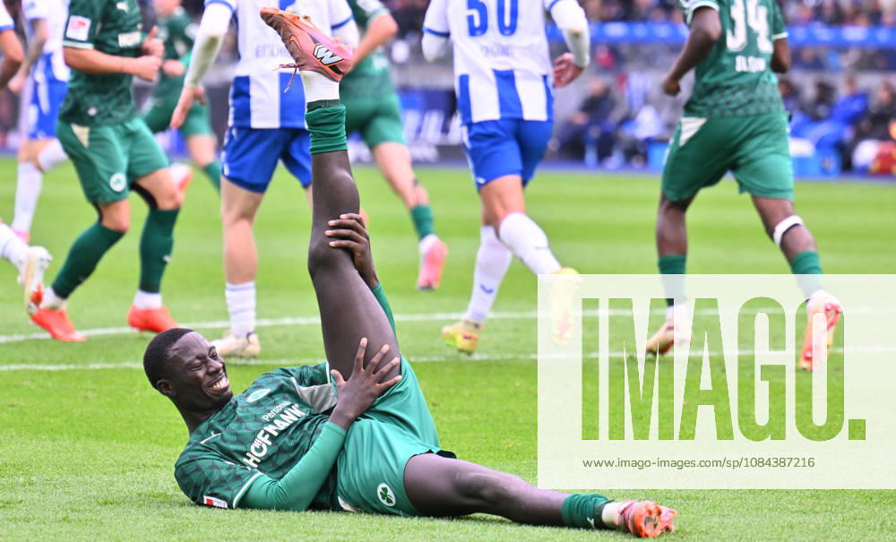 Soccer Season 2026–2027, Matchday 2, Bundesliga, Hertha BSC Berlin vs. SpVgg Greuther Fürth (Kleeblatt), Sports photo by Zink . DFL regulations prohibit any use of photographs as image sequences and or quasi-video; for editorial use only for editorial use only. oOmar Sillah, 42, of SpVgg Greuther Fürth, is on the ground with a cramp