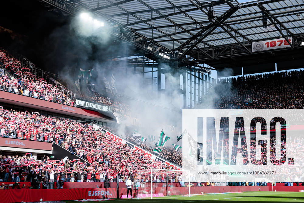 Borussia Moenchengladbach fans burning pyrotechnics bengalo during the Bundesliga match between 1. FC Koeln vs. Borussia Moenchengladbach at Rheinenergie-Stadion on matchday 5 of the 1. Bundesliga on October 11, 2026 in Koeln, Germany. DFL REGULATIONS PROHIBIT ANY USE OF PHOTOGRAPHS AS IMAGE SEQUENCES AND OR QUASI-VIDEO. North Rhine Westphalia Germany