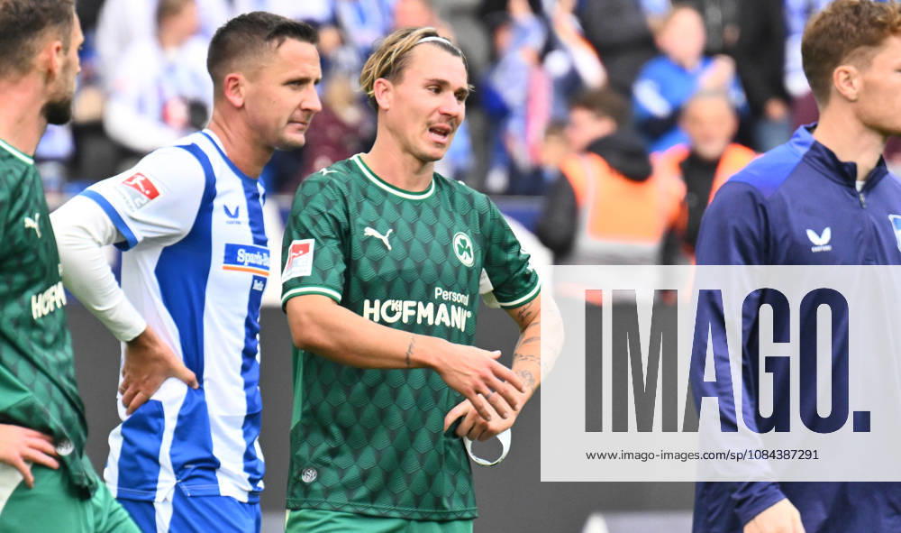 Soccer Season 2026–2027, Matchday 2, Bundesliga, Hertha BSC Berlin vs. SpVgg Greuther Fürth (Kleeblatt), Sports photo by Zink . DFL regulations prohibit any use of photographs as image sequences and or quasi-video; for editorial use only for editorial use only. Paul Seguin, 30, Hertha BSC; Felix Klaus, 30, SpVgg Greuther Fürth, after the game