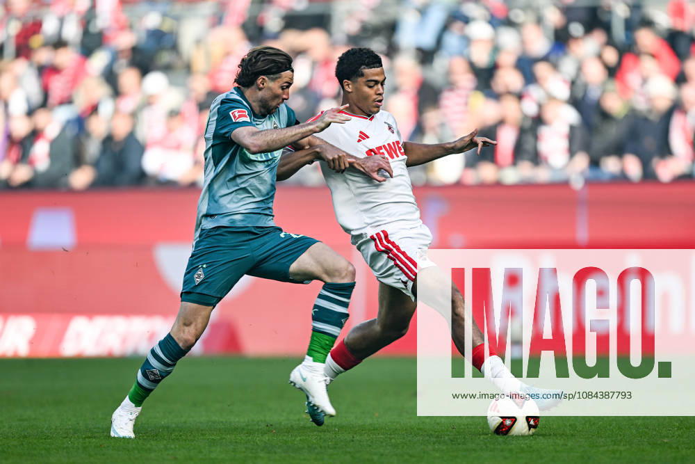From left: Joe Scally (Mönchengladbach) and Jahmai Simpson Pusey (Cologne) in a one-on-one battle, 29, 22, 11, 10, 2026 ¢ Soccer ¢ 1. FC Cologne vs. Borussia Mönchengladbach, RheinEnergieStadion, Cologne, DFB and DFL regulations prohibit any use of photographs as image sequences and or quasi-video. NRW, Germany