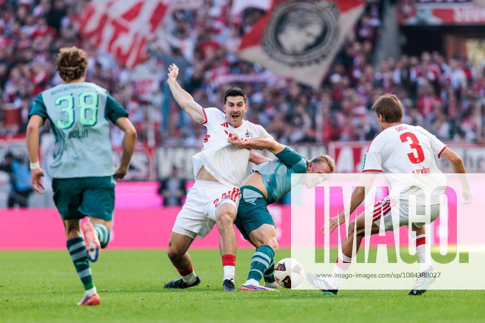 Luka Lochoshvili (1. FC Koeln, 24) and Isac Lidberg (Borussia Moenchengladbach, 3) battle for the ball during the Bundesliga match between 1. FC Koeln vs. Borussia Moenchengladbach at Rheinenergie-Stadion on matchday 5 of the 1. Bundesliga on October 11, 2026 in Koeln, Germany. DFL REGULATIONS PROHIBIT ANY USE OF PHOTOGRAPHS AS IMAGE SEQUENCES AND OR QUASI-VIDEO. North Rhine Westphalia Germany
