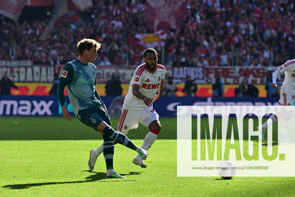 Cologne Soccer, Men s, 2026–2027 Season, 1. FC Cologne vs. Borussia Mönchengladbach: A duel between (from left) Robin Hack (Gladbach) and Linton Maina (Cologne). DFL regulations prohibit any use of photographs as image sequences and or quasi-video. Rhein Energie Stadium, North Rhine-Westphalia, Germany