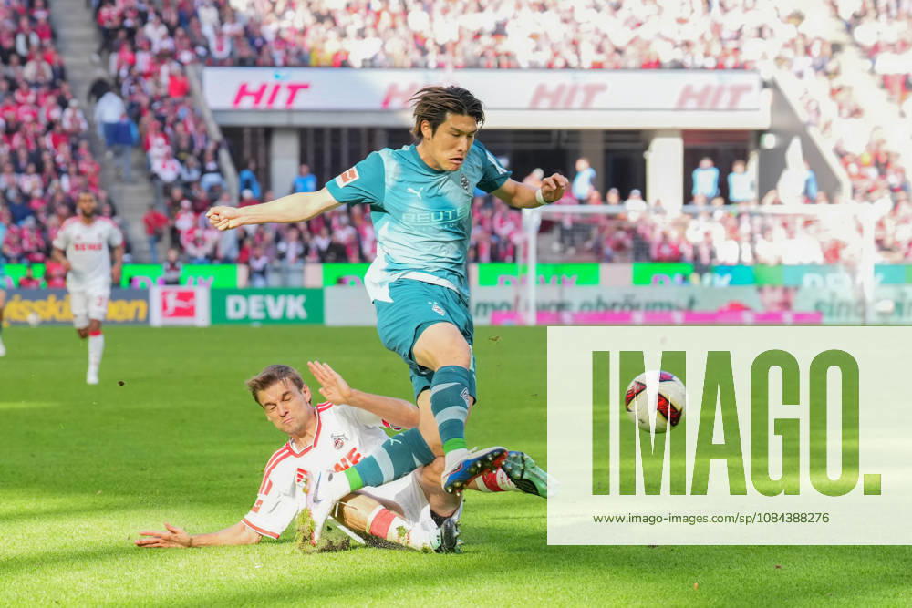 Men s, Soccer, Bundesliga 1, 1. FC Köln vs. Borussia Mönchengladbach, 2026–2027 season, RheinEnergieSTADION Daiki Hashioka, Borussia Mönchengladbach, No. 14 in a tackle against Borna Sosa, 1. FC Köln, 3. DFB regulations prohibit any use of photographs as image sequences and or quasi-video
