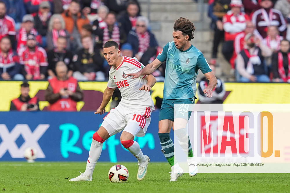 Men s, Soccer, Bundesliga 1, 1. FC Köln vs. Borussia Mönchengladbach, 2026–2027 season, RheinEnergieSTADION: Said El Mala of 1. FC Köln, No. 10, in a tackle against Joe Scally of Borussia Mönchengladbach, No. 29. DFB regulations prohibit any use of photographs as image sequences and or quasi-video.