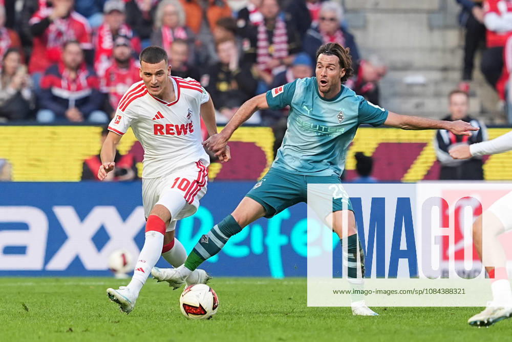 Men s, Soccer, Bundesliga 1, 1. FC Köln vs. Borussia Mönchengladbach, 2026–2027 season, RheinEnergieSTADION: Said El Mala of 1. FC Köln, No. 10, in a tackle against Joe Scally of Borussia Mönchengladbach, No. 29. DFB regulations prohibit any use of photographs as image sequences and or quasi-video.