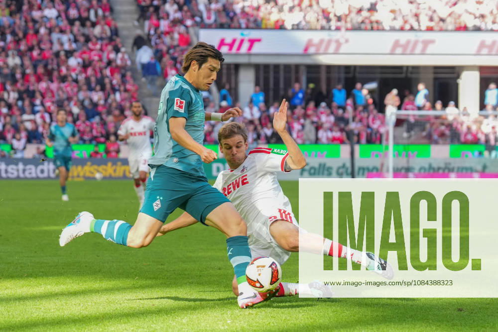 Men s, Soccer, Bundesliga 1, 1. FC Köln vs. Borussia Mönchengladbach, 2026–2027 season, RheinEnergieSTADION Daiki Hashioka, Borussia Mönchengladbach, No. 14 in a tackle against Borna Sosa, 1. FC Köln, 3. DFB regulations prohibit any use of photographs as image sequences and or quasi-video