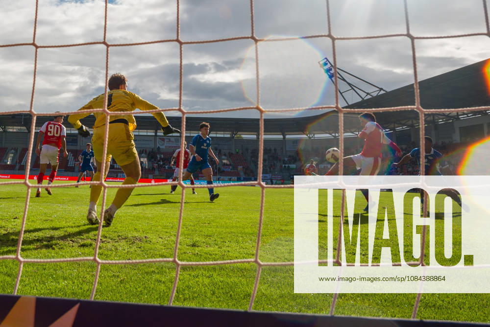 Osman Atilgan (HFC) scores the 1-0 goal against goalkeeper Linus Löffler (RSV), 1, Hallescher FC vs. RSV Eintracht 1949, Soccer, Northeast Regional League, Matchday 12, 2026–27 Season, October 11, 2026, Halle Leuna Chemie Stadium, ST Deutschland