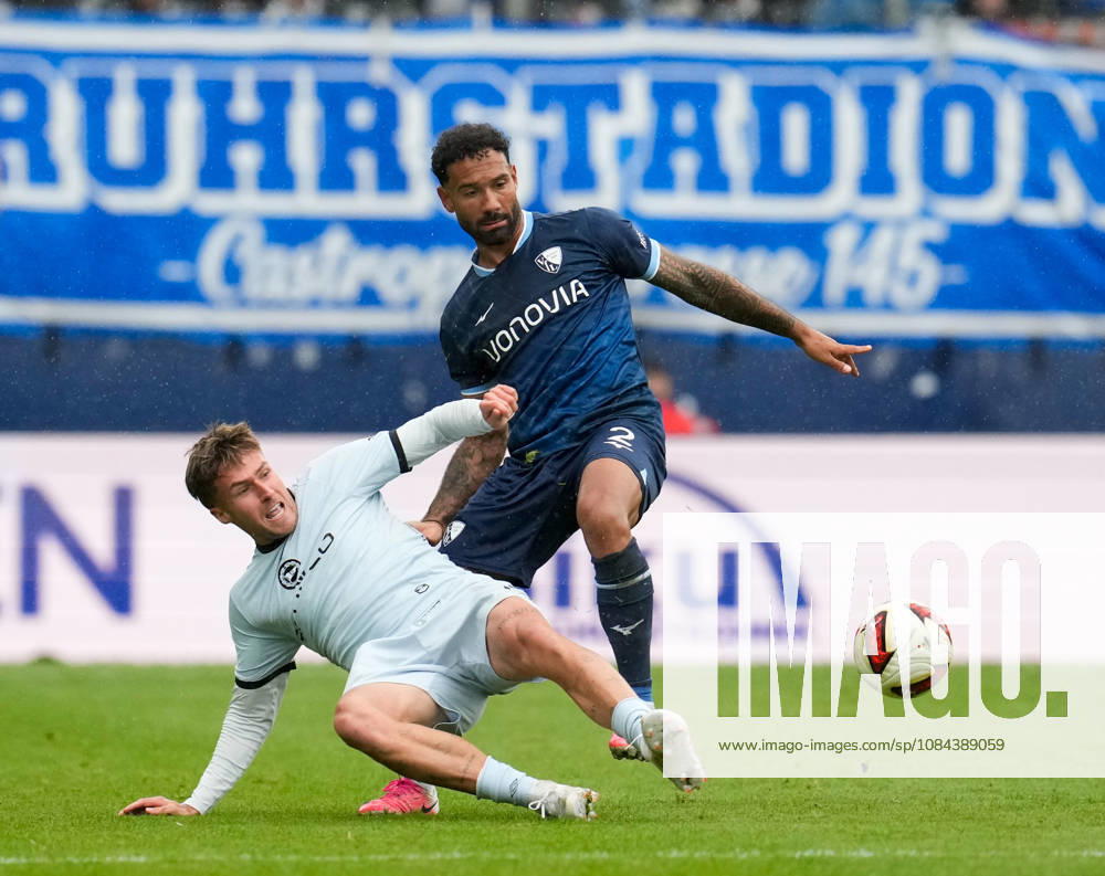 Joel Grodowski of DSC Arminia Bielefeld, No. 11, in a tackle with Sean Klaiber of VfL Bochum 1848, 2 GER, VfL Bochum 1848 vs. DSC Arminia Bielefeld, 2. Bundesliga, Matchday 7, 2026–27 season, Vonovia Ruhrstadion, Bochum, October 11, 2026 DFL REGULATIONS PROHIBIT ANY USE OF PHOTOGRAPHS AS IMAGE SEQUENCES AND OR QUASI-VIDEO VfL Bochum 1848 vs. DSC Arminia Bielefeld, 2. Bundesliga, Matchday 7, 2026–27 Season, October 11, 2026, Bochum