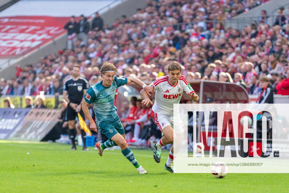 Hugo Bolin of Borussia Mönchengladbach, 38, and Julian Pauli of 1. FC Köln, 03, in a tackle during the 1. FC Köln vs. Borussia Mönchengladbach match, soccer, Bundesliga, Matchday 5, 2026–27 season, October 12, 2026. DFL regulations prohibit any use of photographs as image sequences and or quasi-video, 1. FC Köln vs. Borussia Mönchengladbach, soccer, Bundesliga, Matchday 5, 2026–27 season, October 12, 2026, Cologne