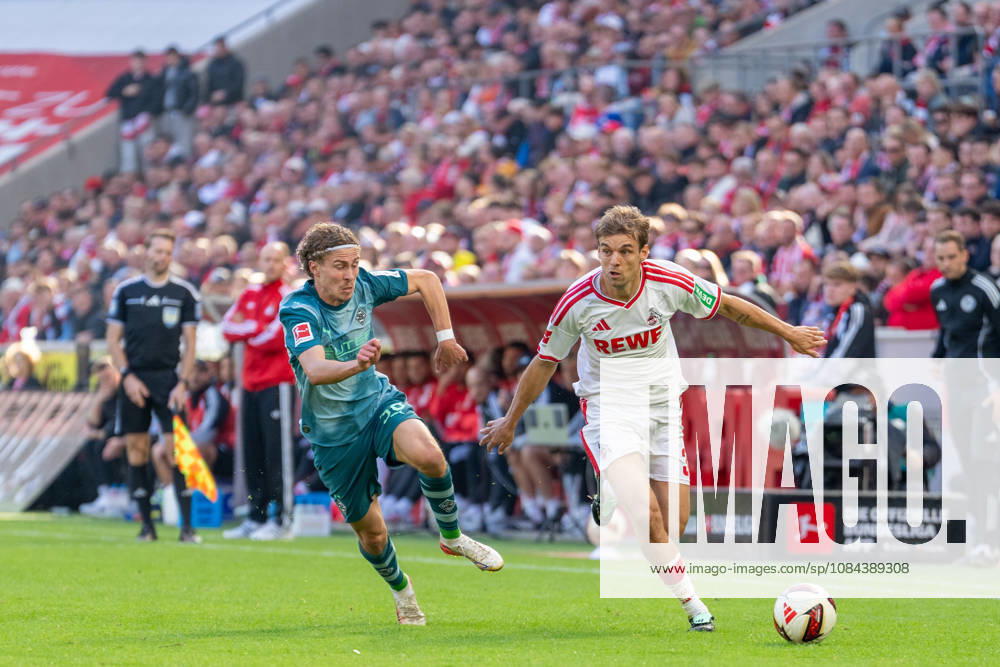 Hugo Bolin of Borussia Mönchengladbach, 38, and Julian Pauli of 1. FC Köln, 03, in a tackle during the 1. FC Köln vs. Borussia Mönchengladbach match, soccer, Bundesliga, Matchday 5, 2026–27 season, October 12, 2026. DFL regulations prohibit any use of photographs as image sequences and or quasi-video, 1. FC Köln vs. Borussia Mönchengladbach, soccer, Bundesliga, Matchday 5, 2026–27 season, October 12, 2026, Cologne