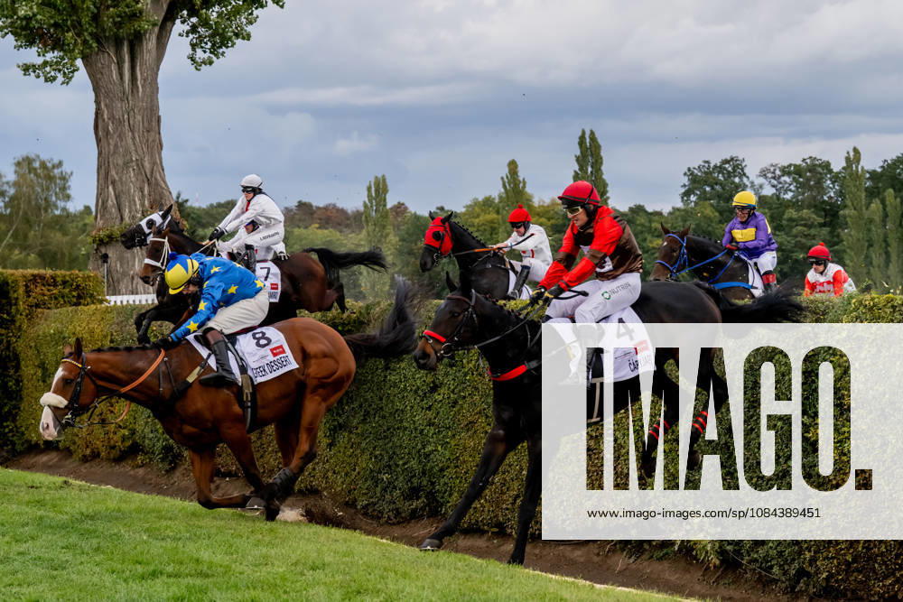 The 136th Grand Pardubice Steeplechase (6,900m), in Pardubice, Czech Republic, on October 11, 2026. The horses cross the Taxis Ditch. In the front, from the right, Adam Cmiel on Caryjape and James Best on Greek Dessert. (CTKxPhoto DavidxTanecek) CTKPhotoP2026101104519 CTKPhotoP2026101104519