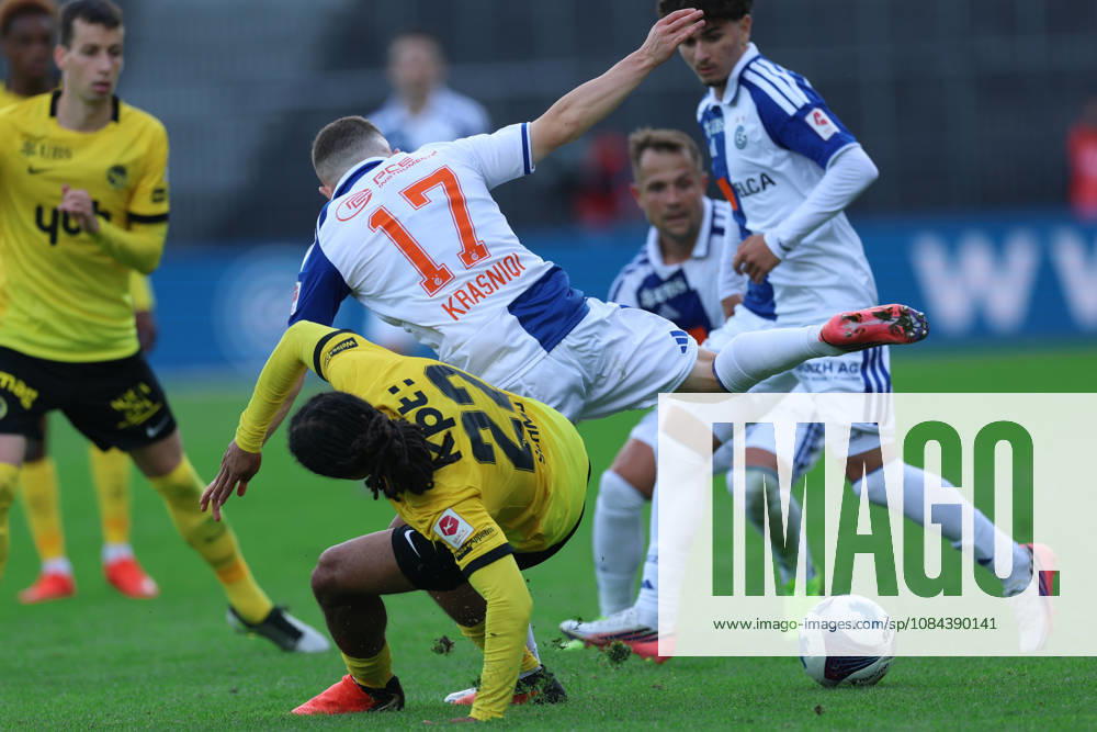 GC Zurich vs. BSC Young Boys, Brack Super League, October 11, 2026: Isaac Schmidt, 22, BSC Young Boys, left, and Samuel Krasniqi, 17, Grasshopper Club Zurich, in the Brack Super League match between Grasshopper Club Zurich (GCZ) and BSC Young Boys (YB) on October 11, 2026, at Letzigrund Stadium in Zurich, Switzerland. Zurich, Letzigrund Stadium, Zurich, Switzerland