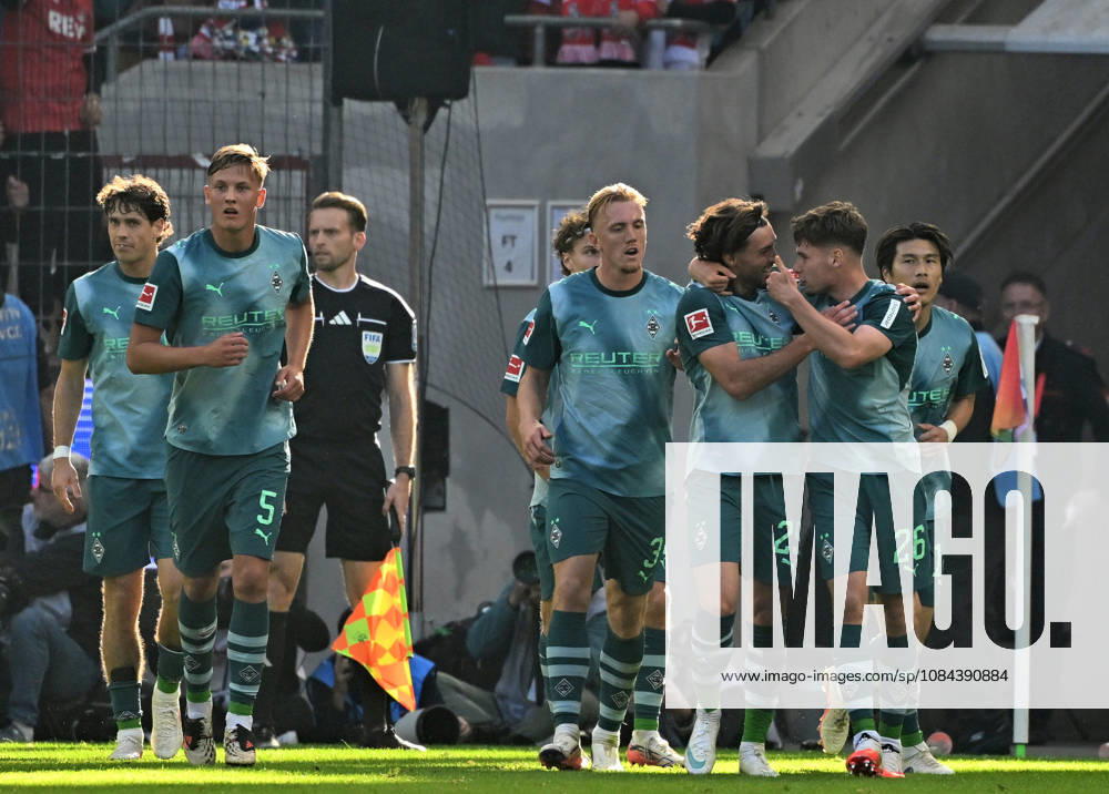 Cologne Soccer, Men s, 2026–2027 Season, 1. FC Cologne vs. Borussia Mönchengladbach: Gladbach celebrates after scoring the 1–1 goal; right: goal scorer Joe Scally; Gladbach here with Lukas Ullrich; right: DFL regulations prohibit any use of photographs as image sequences and or quasi-video; RheinEnergie Stadium, North Rhine-Westphalia, Germany