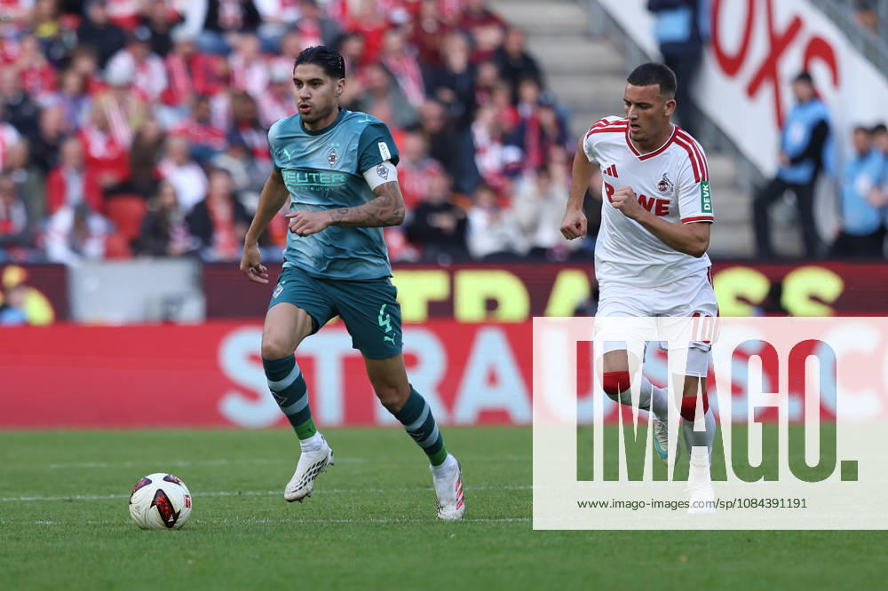 Soccer, Bundesliga, 1. FC Köln vs. Borussia Mönchengladbach, RheinEnergieSTADION, Matchday 5, 2026–2027 Season: Kevin Diks (Borussia Mönchengladbach) 4 in a tackle against Said El Mala (1. FC Köln) 10. DFB regulations prohibit any use of photographs as image sequences and or quasi-video. Photo: WilkowskixPressefotoKochx, North Rhine-Westphalia, Germany
