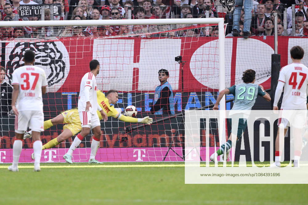 Joe Scally of Borussia Mönchengladbach (right) scores against goalkeeper Marvin Schwäbe of 1. FC Köln, tying the game at 1–1 on October 11, 2026, in the 1. Bundesliga, 2026–2027 season, Matchday 5, 1. FC Köln vs. Borussia Mönchengladbach. DFL regulations prohibit any use of photographs as image sequences and or quasi-video. Cologne, RheinEnergie Stadium, North Rhine-Westphalia, Germany Team2