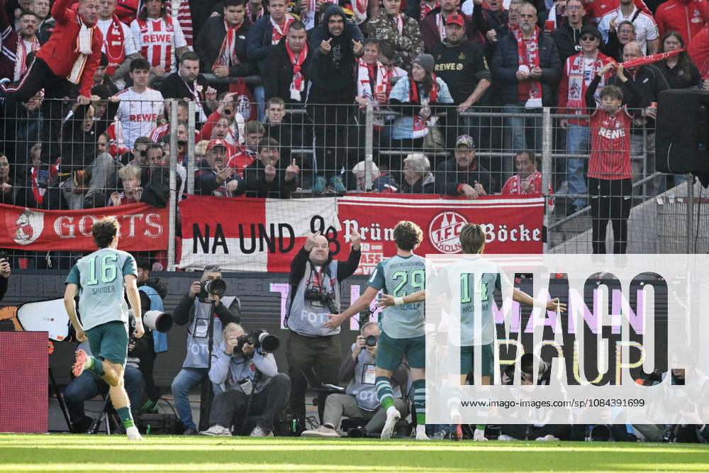 Joe Scally of Borussia Mönchengladbach, center, celebrates in front of the Cologne fan section; in the background, a photographer makes an offensive gesture. October 11, 2026, Soccer, Bundesliga, 2026–2027 season, Matchday 5, 1. FC Köln vs. Borussia Mönchengladbach. DFL regulations prohibit any use of photographs as image sequences and or quasi-video. Cologne, RheinEnergie Stadium, North Rhine-Westphalia, Germany Team2