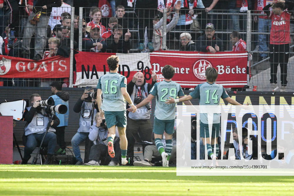 Joe Scally of Borussia Mönchengladbach, center, celebrates in front of the Cologne fan section; in the background, a photographer makes an offensive gesture. October 11, 2026, Soccer, Bundesliga, 2026–2027 season, Matchday 5, 1. FC Köln vs. Borussia Mönchengladbach. DFL regulations prohibit any use of photographs as image sequences and or quasi-video. Cologne, RheinEnergie Stadium, North Rhine-Westphalia, Germany Team2