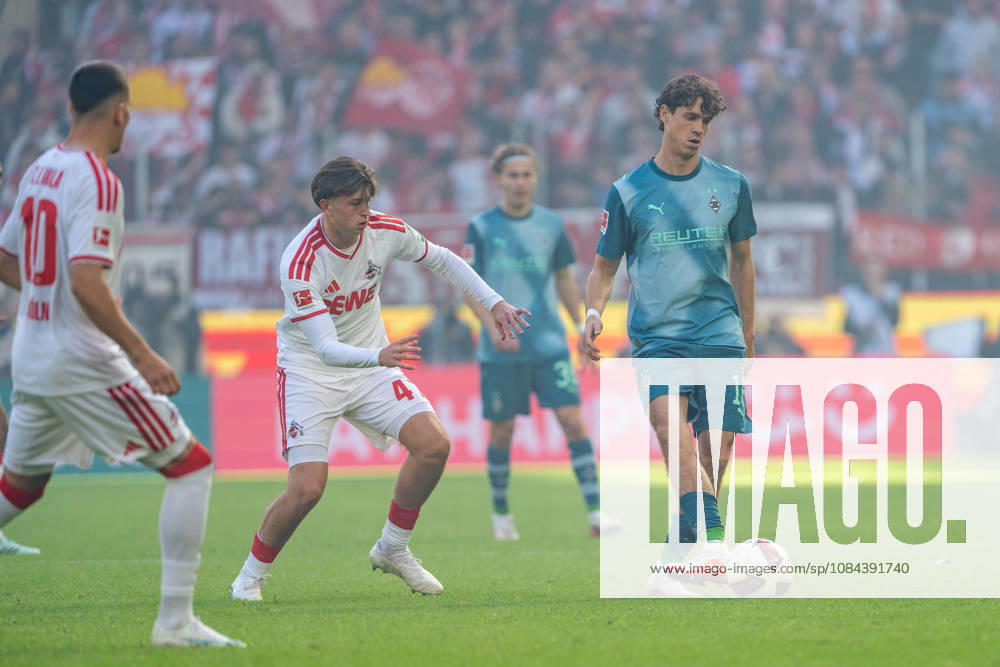 Mikey Moore (1. FC Köln), 47, tackles Philipp Sander (Borussia Mönchengladbach), 16; tackle between 1. FC Köln and Borussia Mönchengladbach; soccer; Bundesliga; Matchday 5; 2026–27 season, October 12, 2026, DFL regulations prohibit any use of photographs as image sequences and or quasi-video, 1 FC Cologne vs. Borussia Mönchengladbach, Soccer, Bundesliga, Matchday 5, 2026–27 Season, October 12, 2026, Cologne