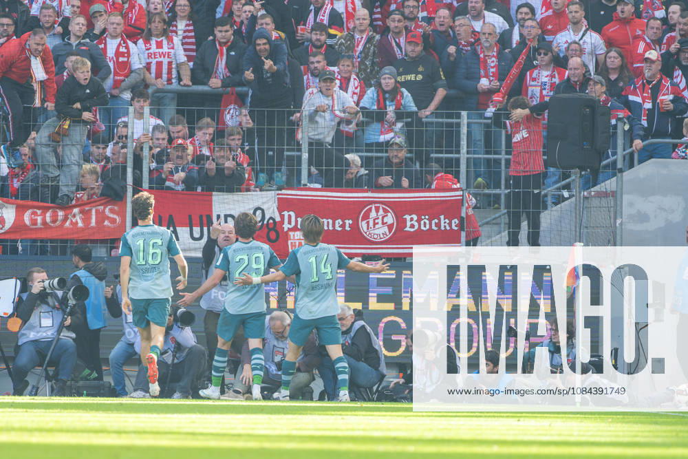 Joe Scully (Borussia Mönchengladbach, No. 29) celebrates his goal to tie the game at 1–1 in front of the Cologne fan section, with Philipp Sander (Borussia Mönchengladbach, No. 16) and Daiki Haschioka (Borussia Mönchengladbach, No. 14) by his side. 1. FC Köln vs. Borussia Mönchengladbach, Soccer, Bundesliga, Matchday 5, 2026–27 season, October 12, 2026. DFL regulations prohibit any use of photographs as image sequences and or quasi-video, 1. FC Köln vs. Borussia Mönchengladbach, soccer, Bundesliga, Matchday 5, 2026–27 season, October 12, 2026, Cologne