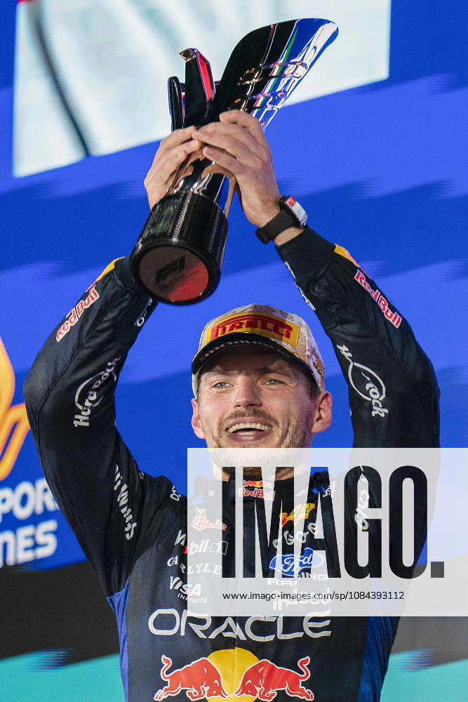 FORMULA 1 SINGAPORE AIRLINES SINGAPORE GRAND PRIX 2026 Max Verstappen (NED) 3 Red Bull Racing celebrates on the podium after winning the race during the Formula 1 Singapore Airlines Singapore Grand Prix 2026, Round 17 of the 2026 Formula 1 World Championship, WM, Weltmeisterschaft from 9th - 11th October 2026 at the Marina Bay Street Circuit, Singapore. Credit: Robbie Hoad Every Second Media Editorial use only. All images are copyright Every Second Media Limited. No images may be reproduced without prior permission.