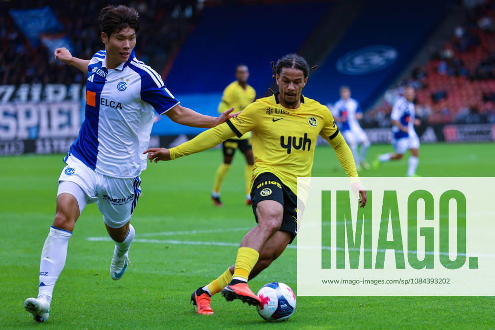 GC Zurich vs. BSC Young Boys, Brack Super League, October 11, 2026; Isaac Schmidt, 22, BSC Young Boys, right, in a footrace with Youngjun Lee, 18, of Grasshopper Club Zurich during the Brack Super League match between Grasshopper Club Zurich (GCZ) and BSC Young Boys (YB) on October 11, 2026, at Letzigrund Stadium in Zurich, Switzerland. Zurich, Letzigrund Stadium, Zurich, Switzerland