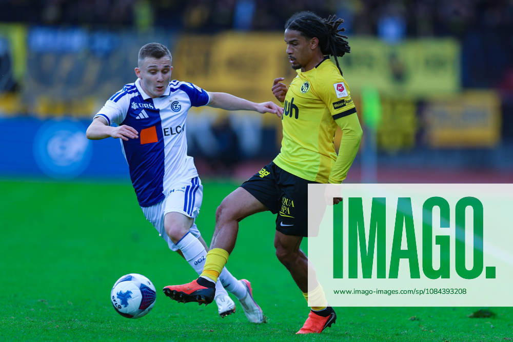 GC Zurich vs. BSC Young Boys, Brack Super League, October 11, 2026: Isaac Schmidt, 22, BSC Young Boys, right, and Samuel Krasniqi, 17, Grasshopper Club Zurich, in the Brack Super League match between Grasshopper Club Zurich (GCZ) and BSC Young Boys (YB) on October 11, 2026, at Letzigrund Stadium in Zurich, Switzerland; Zurich, Letzigrund Stadium, Zurich, Switzerland