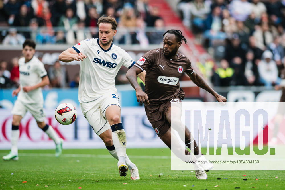 2. Bundesliga: FC St. Pauli vs. Karlsruher SC, October 11, 2026; Christoph Kobald (Karlsruher SC, 22) vs. Ricky Jade Jones (FC St. Pauli, 26), tackle, soccer, 2. Bundesliga, Matchday 7: FC St. Pauli vs. Karlsruher SC on October 11, 2026, at Millerntor Stadium, Hamburg. DFL regulations prohibit any use of photographs as image sequences and or quasi-video.