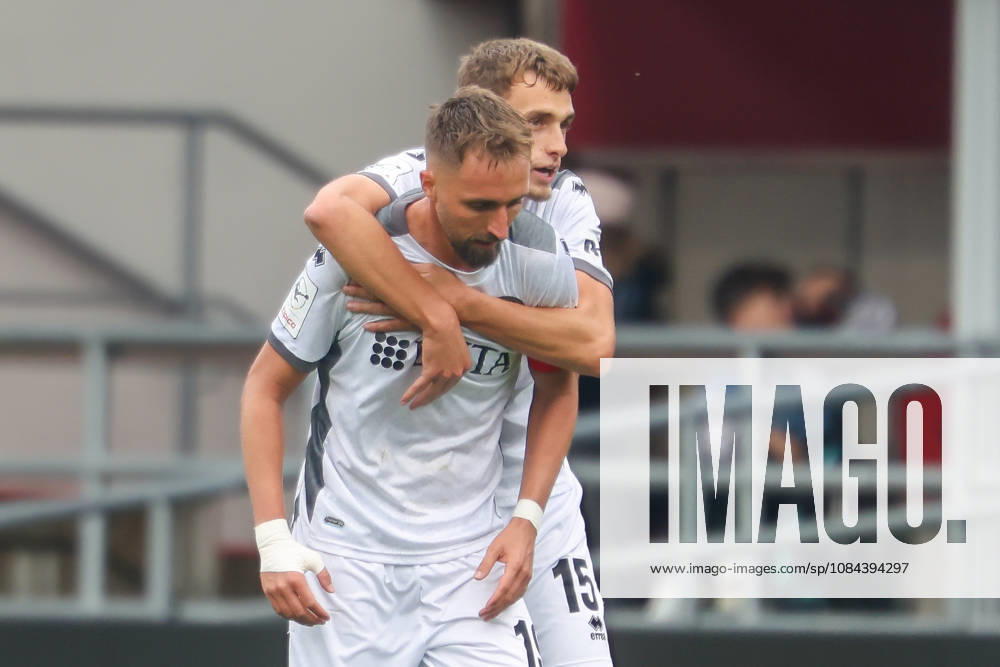 Ingolstadt, Germany, October 11, 2026, 3rd League 2026–2027, Matchday 8: FC Ingolstadt 04 vs. SV Wehen Wiesbaden. Pictured from left: goal scorer Florian Hübner (Huebner) of SVWW celebrating after his goal to make it 0–1 with Justin Janitzek of SVWW. DFB DFL regulations prohibit any use of photographs as image sequences and or quasi-video