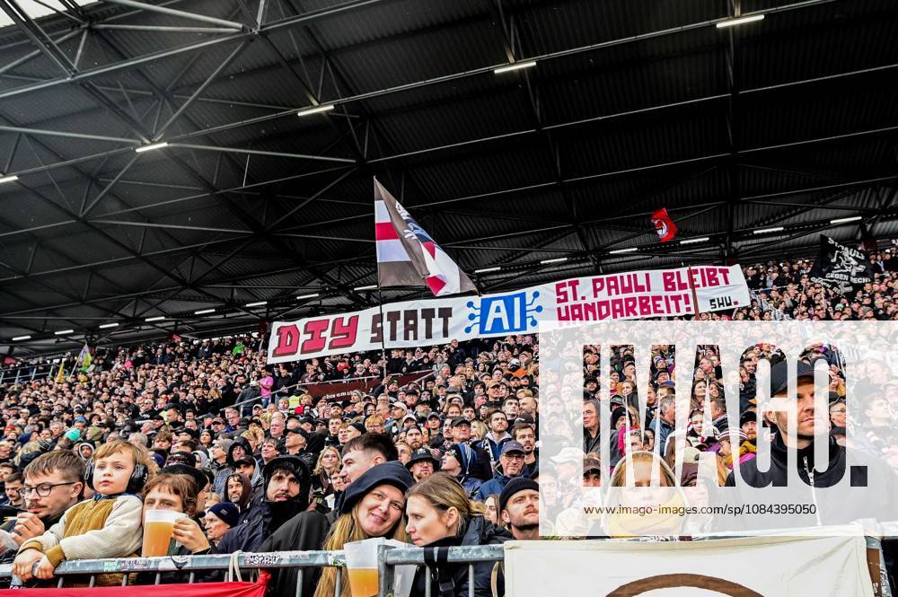 St. Pauli fans in the opposite stands against Ai Ki; DIY stadium anthem instead of Ai St. Pauli remains a labor of love; Germany, Hamburg, Millerntor Stadium, soccer, 2. Bundesliga, FC St. Pauli, Karlsruher SC
