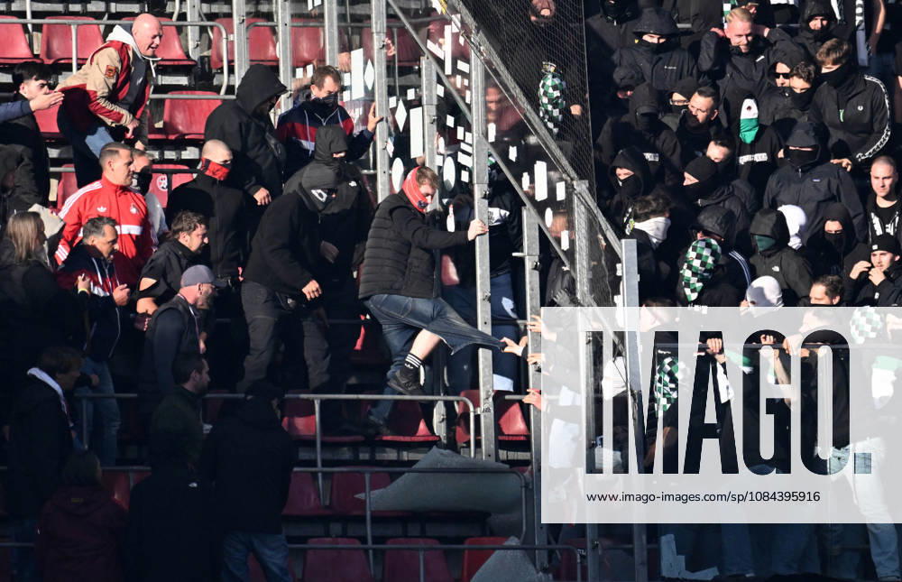 Soccer, Bundesliga 1, 1. FC Köln vs. Borussia Mönchengladbach—Ultras and hooligans from 1. FC Köln (on the left) and Mönchengladbach clash in the North Stand, Cologne