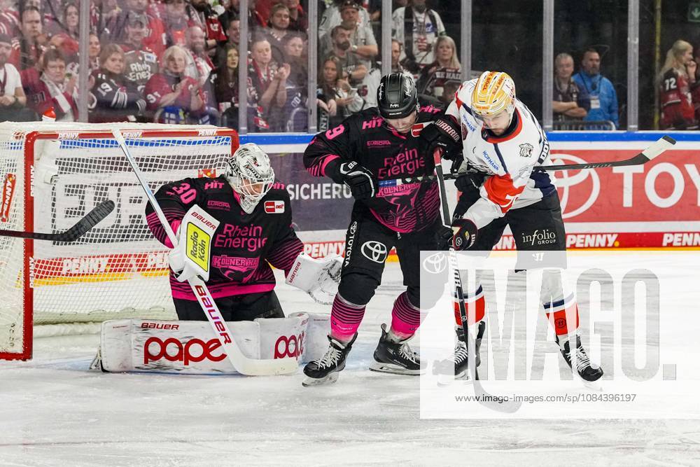 Ice Hockey: Penny DEL, Matchday 8—Cologne Sharks vs. Nuremberg Ice Tigers on October 11, 2026, at the Lanxess Arena in Cologne. Janne Juvonen (Cologne), left: Frederik Storm (Cologne), center: Austin Magera (Nuremberg), right: In accordance with the regulations of the DEL (German Ice Hockey League), the publication and further use of the footage in electronic media and on devices of any kind during the game is not permitted
