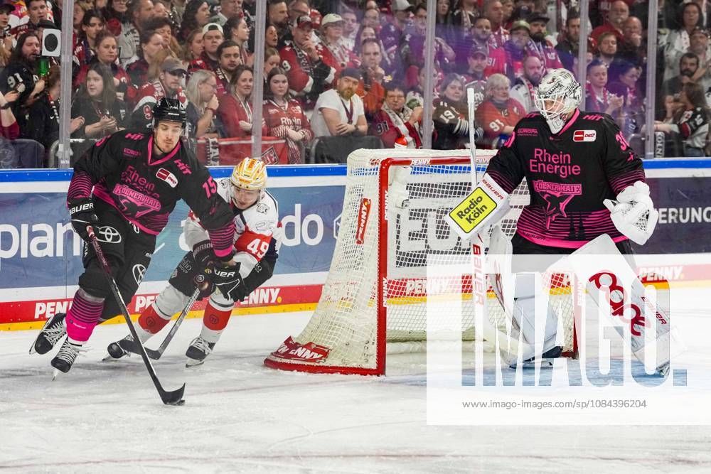Ice Hockey: Penny DEL, Matchday 8—Cologne Sharks vs. Nuremberg Ice Tigers on October 11, 2026, at the Lanxess Arena in Cologne. Louis Marc Aubry (Cologne), left: Thomas Heigl (Nuremberg), center: Janne Juvonen (Cologne), right: In accordance with the regulations of the DEL (German Ice Hockey League), the publication and further use of the footage in electronic media and on devices of any kind during the game is not permitted.