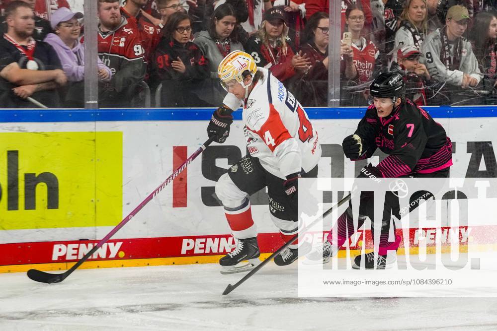 Ice Hockey: Penny DEL, Matchday 8—Cologne Sharks vs. Nuremberg Ice Tigers on October 11, 2026, at the Lanxess Arena in Cologne; Josef Eham (Nuremberg), left: Carlos Händel (Cologne), right: In accordance with the guidelines of the DEL (German Ice Hockey League), the publication and further use of the images in electronic media and on devices of any kind during the game is not permitted.