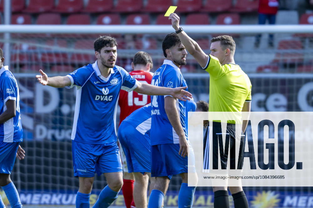Regionalliga Northeast, Season 26-27: Hallescher FC vs. RSV Eintracht 1949 e.V., Halle, Germany, October 11, 2026. Pictured from left: Aleksandar Bilbija (RSV), yellow card, Halle Saale Leuna Chemie Stadium, Saxony-Anhalt, Germany