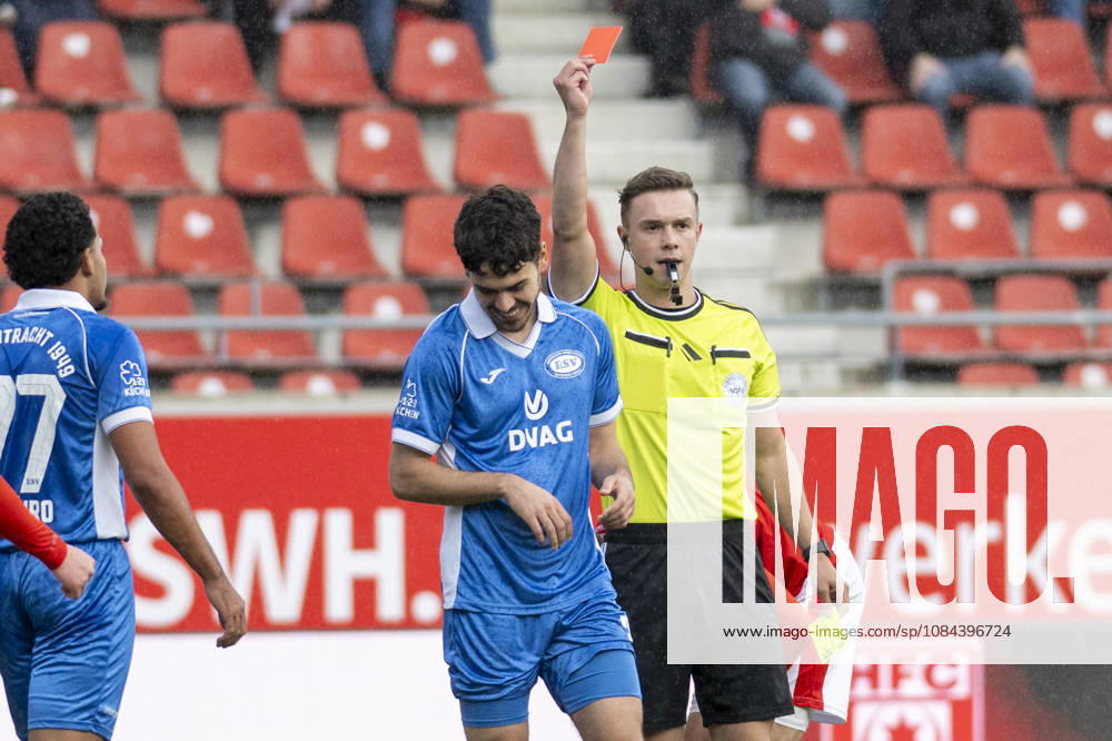 Regionalliga Northeast, Season 26-27: Hallescher FC vs. RSV Eintracht 1949 e.V., Halle, Germany, October 11, 2026. Pictured, from left: Aleksandar Bilbija (RSV), red card, sent off. Halle-Saale-Leuna Chemie Stadium, Saxony-Anhalt, Germany